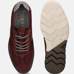 A grey Men's bugatti Casuals Shoes featuring a round toe wing tip, zero heels heel, and a wide fit. Made from premium genuine leather with a durable tr outsole, this laces design offers both style and comfort.