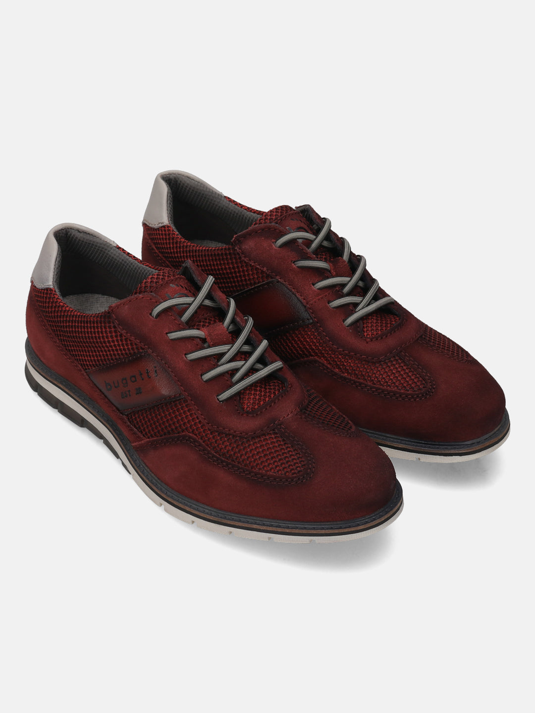 A grey Men's bugatti Casuals Shoes featuring a round toe wing tip, zero heels heel, and a wide fit. Made from premium genuine leather with a durable tr outsole, this laces design offers both style and comfort.