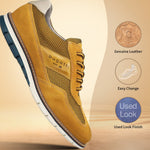 A yellow Men's bugatti Casuals Shoes featuring a round toe wing tip, zero heels heel, and a wide fit. Made from premium genuine leather with a durable tr outsole, this laces design offers both style and comfort.