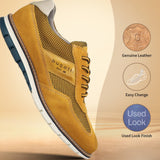 A yellow Men's bugatti Casuals Shoes featuring a round toe wing tip, zero heels heel, and a wide fit. Made from premium genuine leather with a durable tr outsole, this laces design offers both style and comfort.