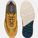 A yellow Men's bugatti Casuals Shoes featuring a round toe wing tip, zero heels heel, and a wide fit. Made from premium genuine leather with a durable tr outsole, this laces design offers both style and comfort.