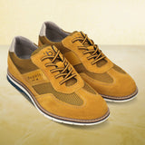 A yellow Men's bugatti Casuals Shoes featuring a round toe wing tip, zero heels heel, and a wide fit. Made from premium genuine leather with a durable tr outsole, this laces design offers both style and comfort.