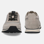 Taupe leather sneakers by bugatti with black laces, seen from a head-on perspective.