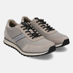 Taupe premium leather comfort sneakers by bugatti, featuring black laces and a sporty sole.