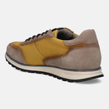 Taupe and mustard sneaker by Bugatti, with suede and textile panels, and a two-tone sole.