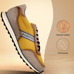 Side view of the bugatti Cirino Taupe Premium Leather Comfort Mid Top Sneaker, with a yellow fabric body and brown suede accents.