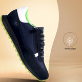 Side view of a bugatti Cirino dark blue sneaker with premium leather, a zipper, and green soles.