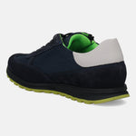 Dark blue leather sneaker by bugatti with a light gray heel accent and a lime green sole.