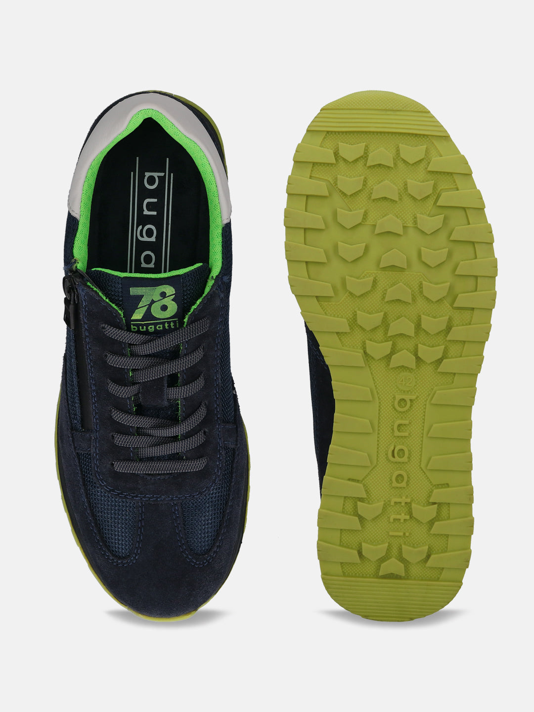 Dark blue premium leather sneakers by bugatti, showing the sole with green details, laces, and zip.
