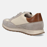 Sand-colored leather and textile sneaker by Bugatti with a brown heel accent.