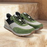 bugatti Cirino green sneakers featuring premium leather, with olive green and light gray suede accents.