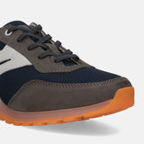 Dark grey sneaker by bugatti with navy mesh fabric and a white accent.