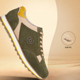 Dark green leather sneakers by bugatti, with beige accents and yellow heel counter, shown in a side view.