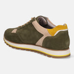 Green leather comfort sneakers by bugatti with beige and yellow accents, shown in back view.