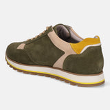 Green leather comfort sneakers by bugatti with beige and yellow accents, shown in back view.