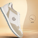 Sand-colored leather comfort sneakers by bugatti, featuring perforated detailing and a white midsole with a green accent stripe.