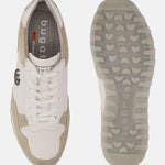 White and sand-colored sneakers from bugatti, showing the sole with grip and branding.