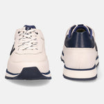 White leather sneakers by bugatti, with navy accents on the heel, sole and laces.
