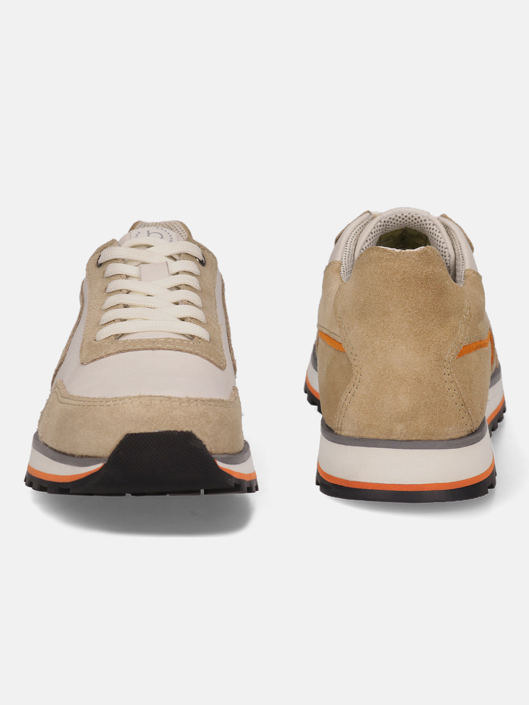 Sand-colored leather sneakers by bugatti, with off-white accents, stacked sole, and orange stripe detailing.