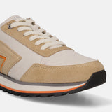 Sand premium leather comfort sneaker by bugatti featuring suede trim and striped sole.