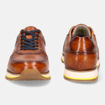 A cognac Men's bugatti Sneakers featuring a round  plain toe, zero heels heel. Made from premium genuine leather with a durable eva outsole, this laces design offers both style and comfort.