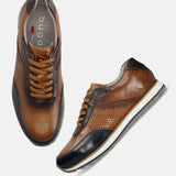 A blue Men's bugatti Sneakers featuring a round toe plain toe, zero heels heel. Made from premium genuine leather with a durable eva outsole, this laces design offers both style and comfort.
