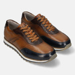 A blue Men's bugatti Sneakers featuring a round toe plain toe, zero heels heel. Made from premium genuine leather with a durable eva outsole, this laces design offers both style and comfort.