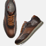 A brown Men's bugatti Sneakers featuring a round toe plain toe, zero heels heel. Made from premium genuine leather with a durable eva outsole, this laces design offers both style and comfort.