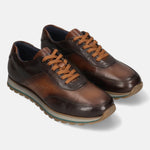 A brown Men's bugatti Sneakers featuring a round toe plain toe, zero heels heel. Made from premium genuine leather with a durable eva outsole, this laces design offers both style and comfort.