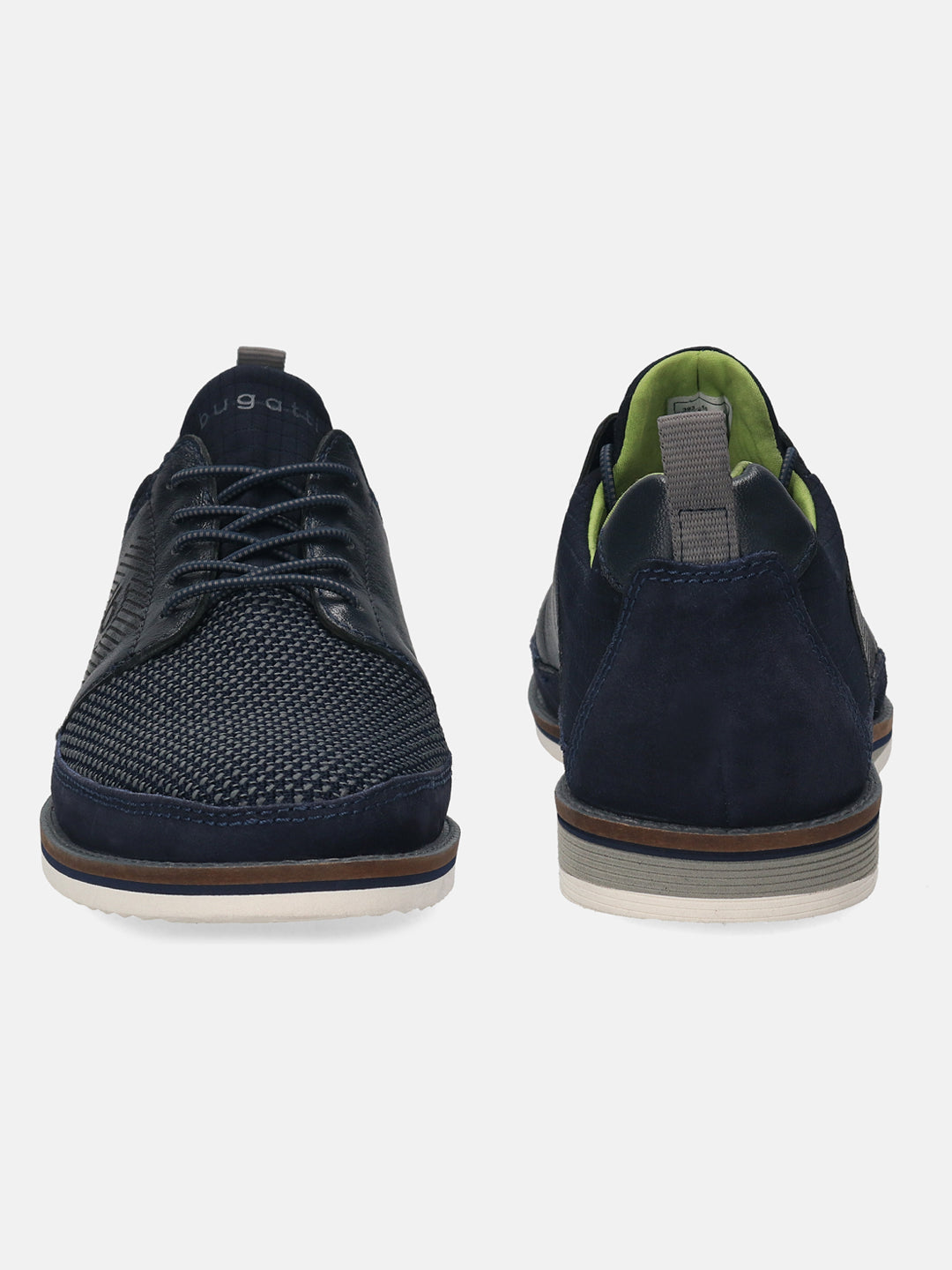 Dark blue casual shoes by bugatti, with textile and leather panels, and patterned rubber soles.