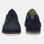 Dark blue casual shoes by bugatti, with textile and leather panels, and patterned rubber soles.