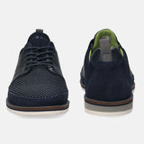 Dark blue casual shoes by bugatti, with textile and leather panels, and patterned rubber soles.