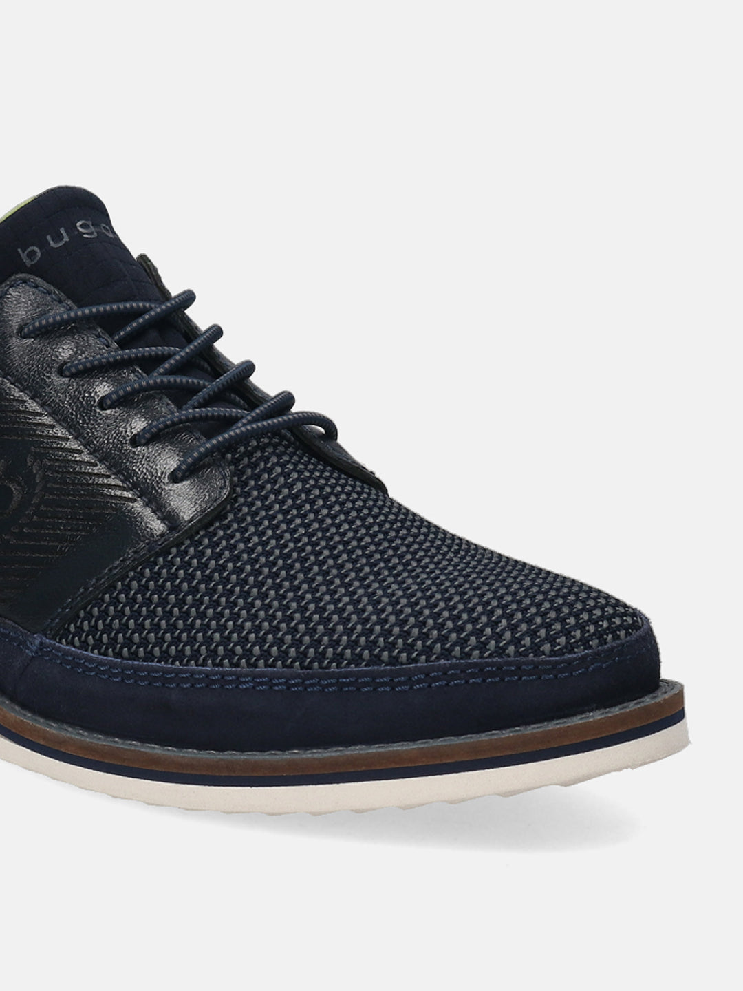 Dark blue casual shoe by bugatti with textured upper, dark laces, and layered sole.