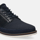 Dark blue casual shoe by bugatti with textured upper, dark laces, and layered sole.