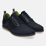 Dark blue casual shoes by bugatti, with a textured upper, lace-up closure, and contrasting sole.