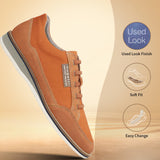Orange casual shoe by bugatti with used look finish, soft fit, and easy change features.