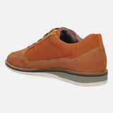 Orange casual shoe by bugatti with suede overlays and a contrasting layered sole, seen from the side.