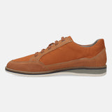 Orange casual shoe by bugatti with suede details and flat, layered sole, shown in profile.
