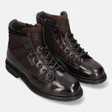 A brown Men's bugatti Ankle Boots featuring a round toe plain toe, moulded  heel. Made from premium genuine leather with a durable tr outsole, this zipper design offers both style and comfort.
