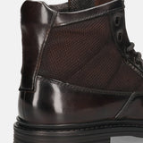 A brown Men's bugatti Ankle Boots featuring a round toe plain toe, moulded  heel. Made from premium genuine leather with a durable tr outsole, this zipper design offers both style and comfort.