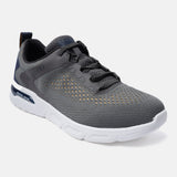 Dark grey sneaker by bugatti, with a perforated design, white sole, and dark laces.