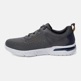 Dark grey sneaker by bugatti with white soles, dark textile details, and tan heel loop, in a side view.
