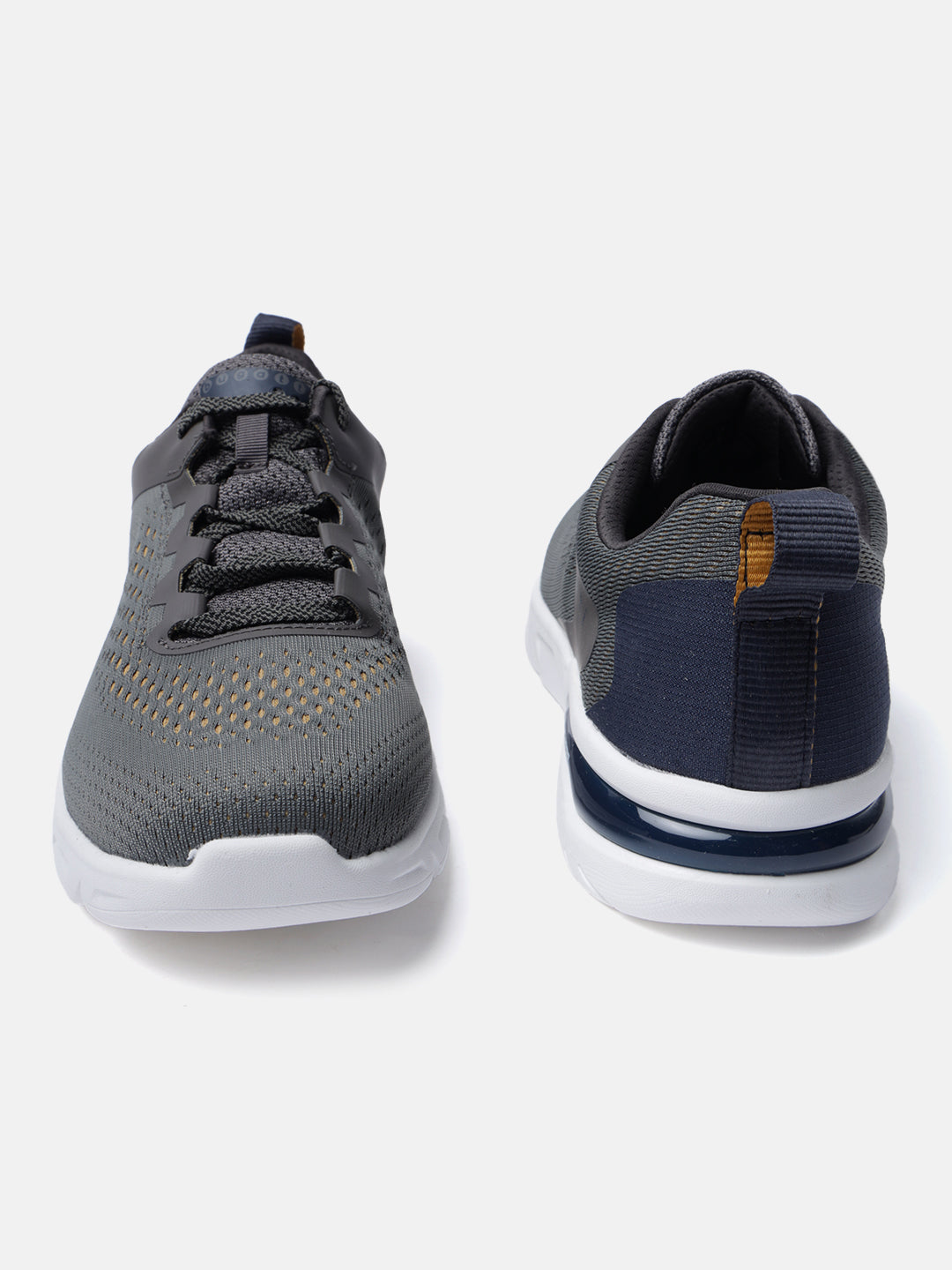 Dark grey comfort sneakers by bugatti, with a white sole and navy heel accent.