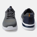 Dark grey comfort sneakers by bugatti, with a white sole and navy heel accent.