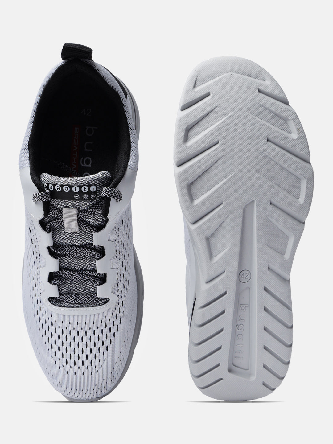 White comfort mid-top sneakers by bugatti with patterned laces and textured rubber soles.