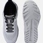 White comfort mid-top sneakers by bugatti with patterned laces and textured rubber soles.