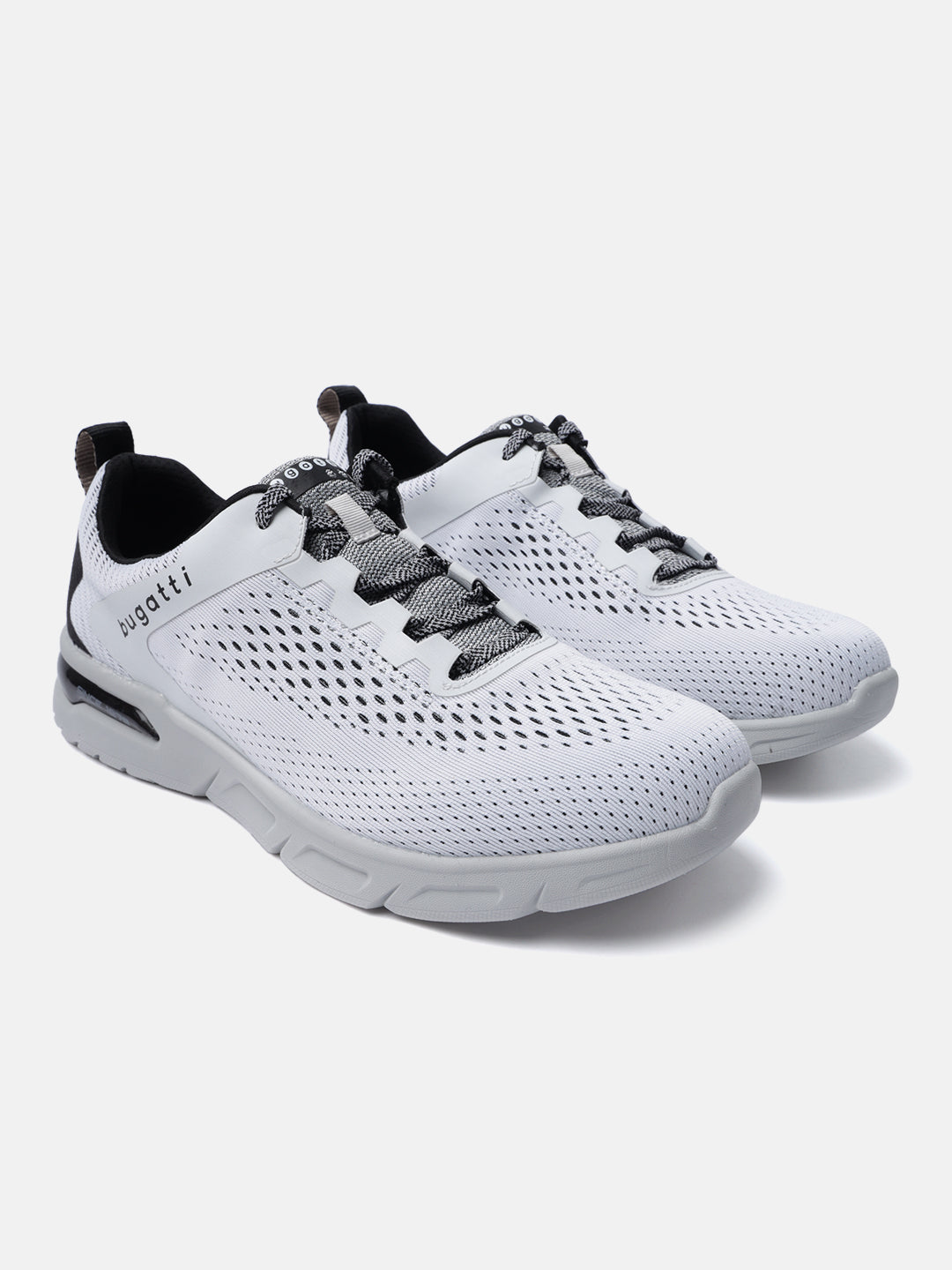 White comfort sneakers by bugatti with a textured finish and gray speckled laces.