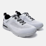 White comfort sneakers by bugatti with a textured finish and gray speckled laces.