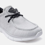 Light gray comfort sneakers by bugatti with dark laces and textured knit upper.