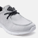 Light gray comfort sneakers by bugatti with dark laces and textured knit upper.